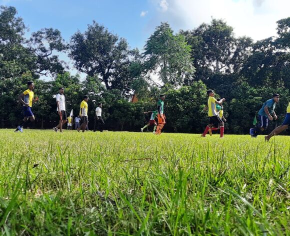 Students Practice at Football Club